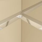 Walk In Wetroom Full Set Corner Fit 8 Close-up of the silver support bar corner joint above the walk-in shower end panel