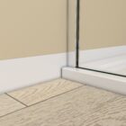 Walk In Wetroom Full Set Corner Fit 6 Close-up of the bottom silver wall profile securing the shower glass beside the tray